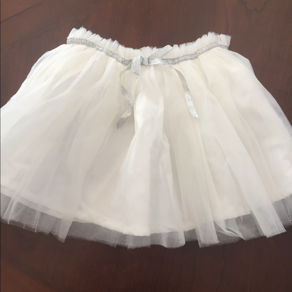 Carter’s white tutu with silver embellished.
